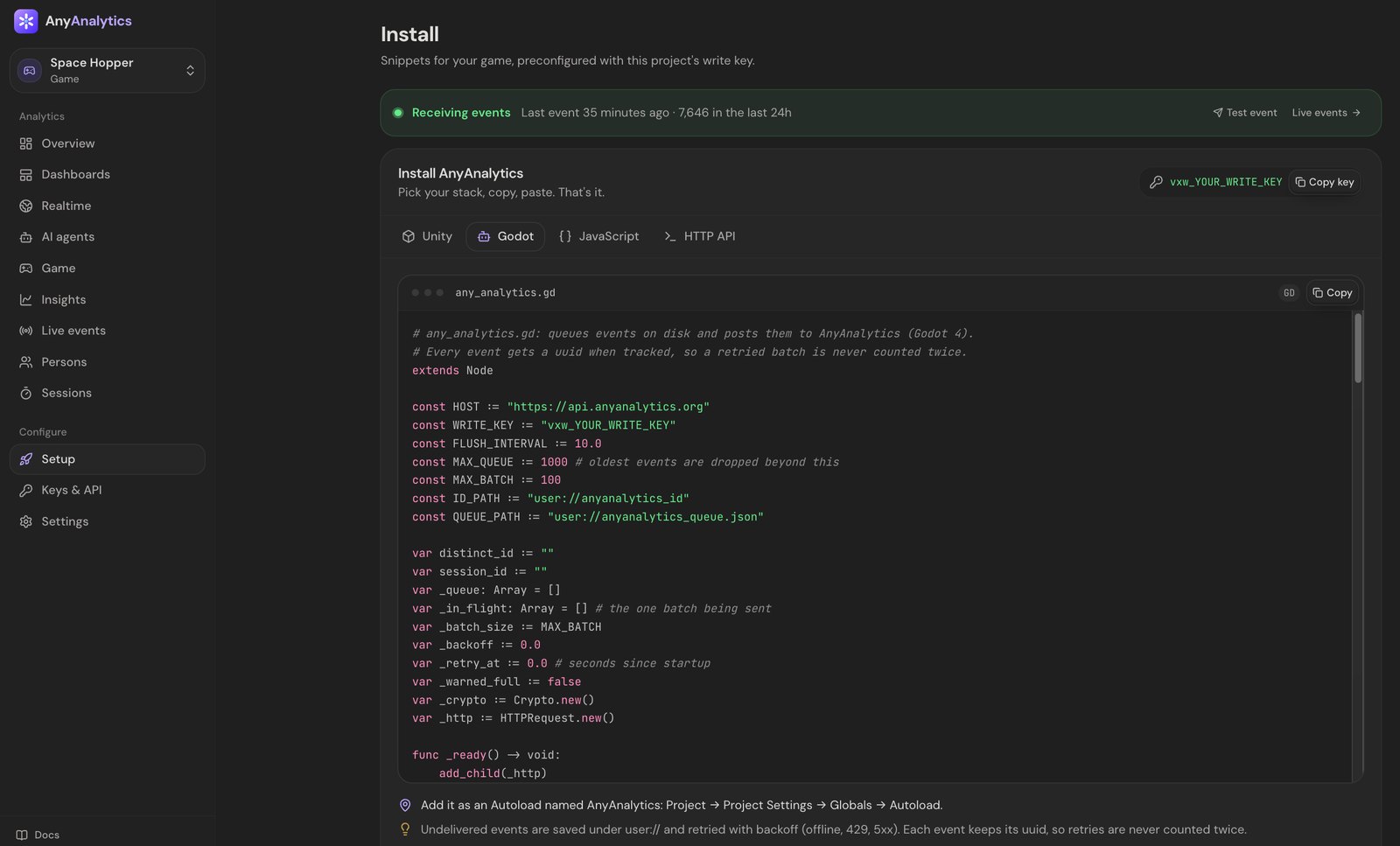 The AnyAnalytics Setup page with the Godot tab selected, showing the any_analytics.gd script with the project's host and write key filled in, a Copy button, and the instruction to add it as an Autoload named AnyAnalytics.